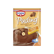 Dr. Oetker Chocolate Hazelnut Pudding mix, 102g packet with chocolate bars and hazelnuts.