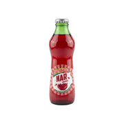 Prime Market Beypazari pomegranate soda in a clear glass bottle with a green cap. The red soda has a label featuring pomegranate imagery.